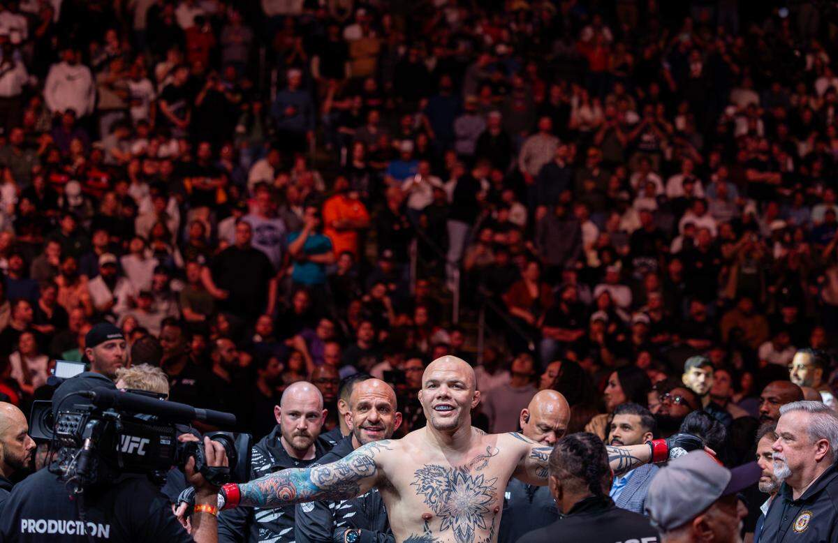 UFC veteran Anthony Smith looks around at the crowd at the T-Mobile Center in Kansas City on Saturday night before his retirement fight during UFC Fight Night: Machado Garry vs. Prates. Smith went on to lose the fight to fellow light heavyweight Zhang Mingyang.