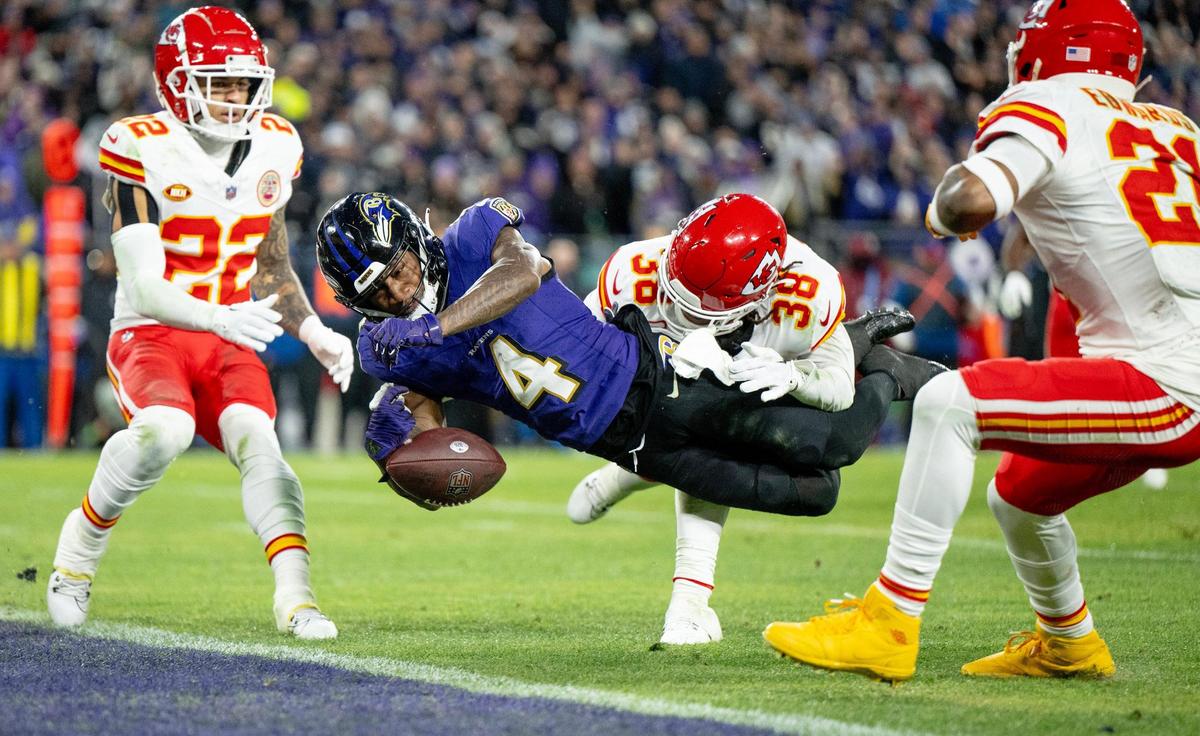 Kansas City Chiefs cornerback L’Jarius Sneed (38) strips Baltimore Ravens wide receiver Zay Flowers (4) of the ball at the goal line during the AFC Championship Game on Sunday, Jan. 28, 2024, in Baltimore.