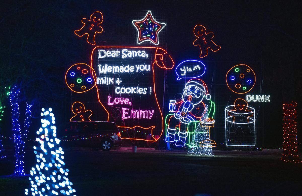 The Dear Santa display at Christmas in the Park, a huge, free drive-thru light show on Wednesday, Dec. 10, 2025, at Longview Lake in Kansas City. The display, staged by Jackson County Parks & Rec, features more than one million lights and over 200 animated displays. It is the 38th year for the popular display.