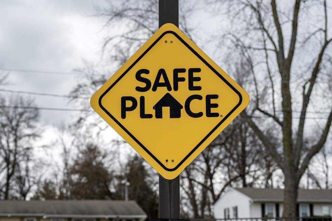 A Safe Place sign is displayed outside a QuikTrip convenience store on Friday Jan. 16, 2026, in Grandview.