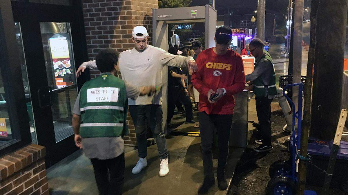 In this September 2018 photo, patrons pass through a security checkpoint at Westport Road and Mill Street in Westport.