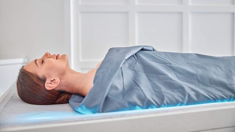 Why everyone’s wrapping themselves in infrared sauna blankets at home: All about the portable heat trend
