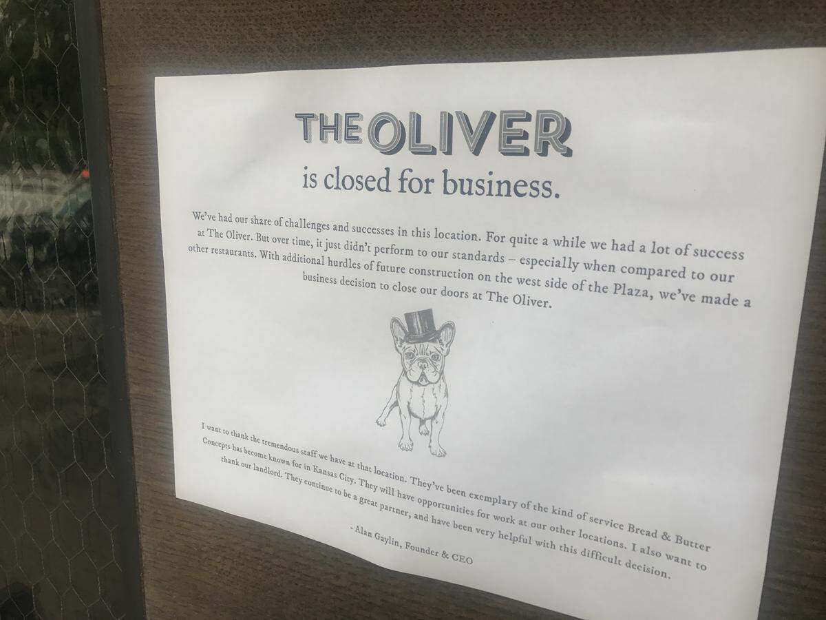 The Oliver on the Country Club Plaza had a closing sign posted on its front door and workers were removing some items Sunday morning.