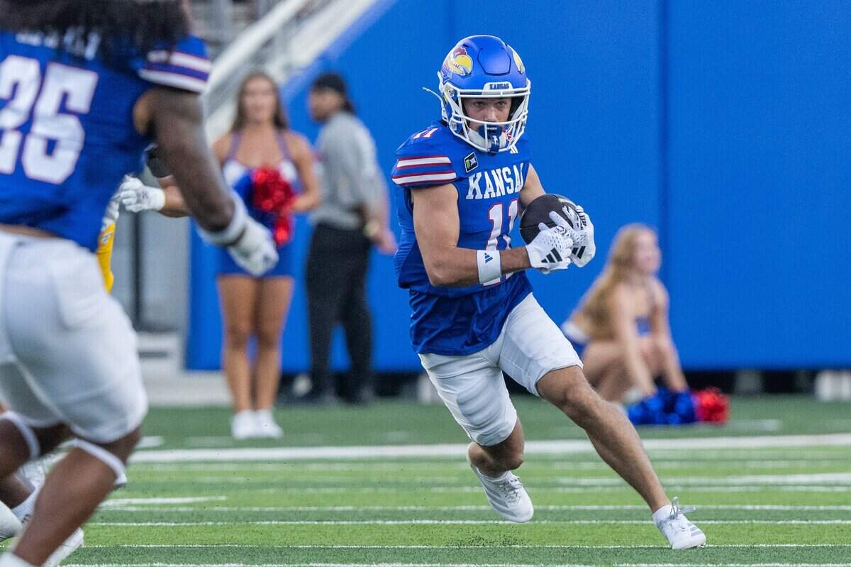 Kansas Jayhawks wide receiver Tate Nagy (11) returns a punt in the first half of the Jayhawks game vs. Long Island University Sharks at David Booth Memorial Stadium on Friday, September 4, 2026, in Lawrence.