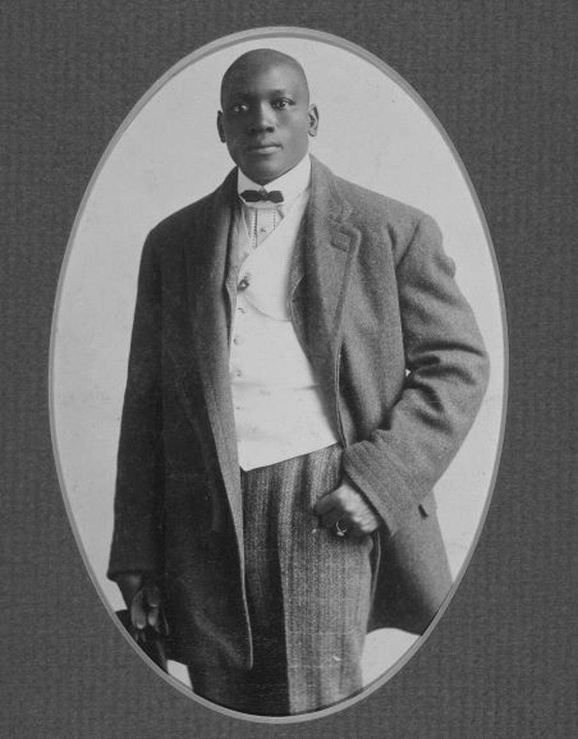 Jack Johnson in about 1903, five years after his first boxing appearance in Kansas City. Johnson was known as a sharp dresser throughout his life.