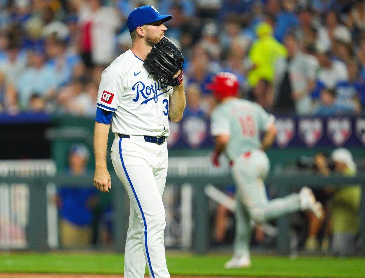 Kansas City Royals relief pitcher Chris Stratton (35) reacts after giving up a home run to Philadelphia Phillies catcher J.T. Realmuto (10) during the eighth inning at Kauffman Stadium on Aug. 24, 2024.
