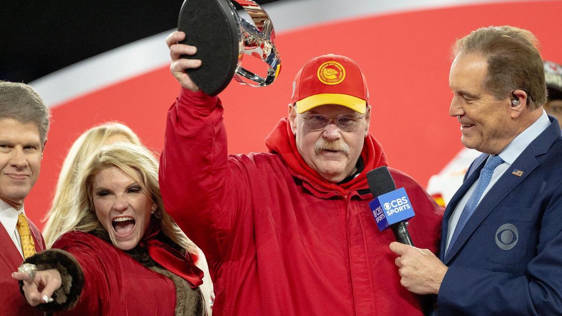 Kansas City Chiefs coach Andy Reid hoists the Lamar Hunt Trophy after the Chiefs defeated the Baltimore Ravens 17-10 in the AFC Championship Game on Sunday in Baltimore.
