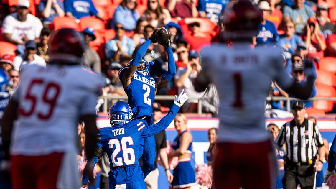 Kansas cornerback Cobee Bryant grabs one of his three interceptions during a win over Houston on Saturday, Oct. 19, 2024, at GEHA Field at Arrowhead Stadium in Kansas City, Missouri.