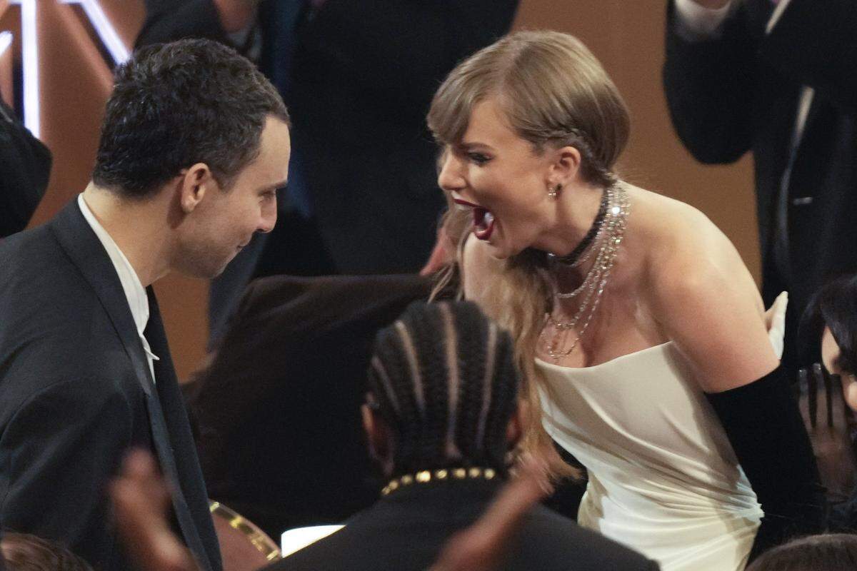 Taylor Swift, with record producer Jack Antonoff, was thrilled to win the Grammy for best pop vocal album, “Midnights,” in Los Angeles on Sunday. She announced a new album in her acceptance speech.