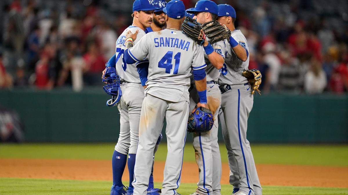 The Kansas City Royals celebrate after a 12-11 win over the Los Angeles Angels in a baseball game in Anaheim, Calif., Tuesday, June 21, 2022. They won in the 11th inning. (AP Photo/Ashley Landis)