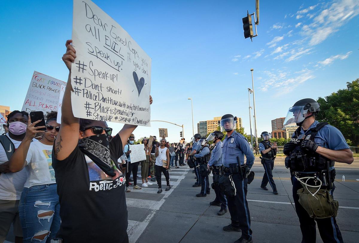 Kansas City protesters got right in the face of police officers at the Country Club Plaza this spring, joining a national movement against police brutality after the death of George Floyd.
