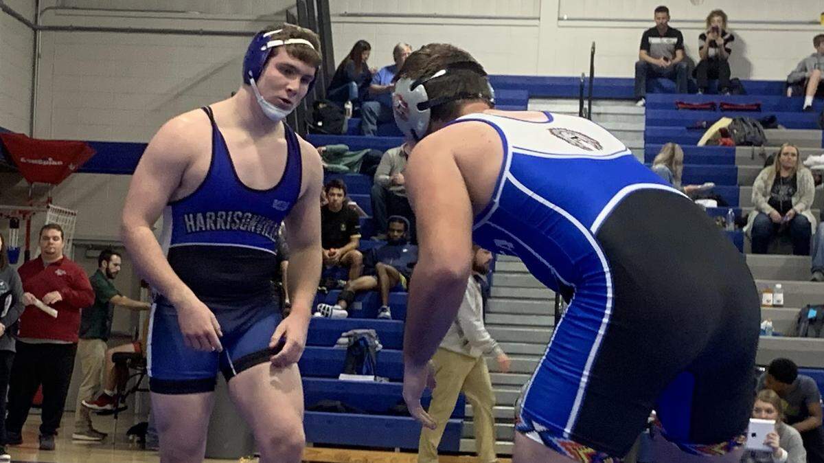 Harrisonville sophomore Trevor Campbell, left, wrestles during the Wildcats’ Harrisonville Tournament Saturday at the high school.