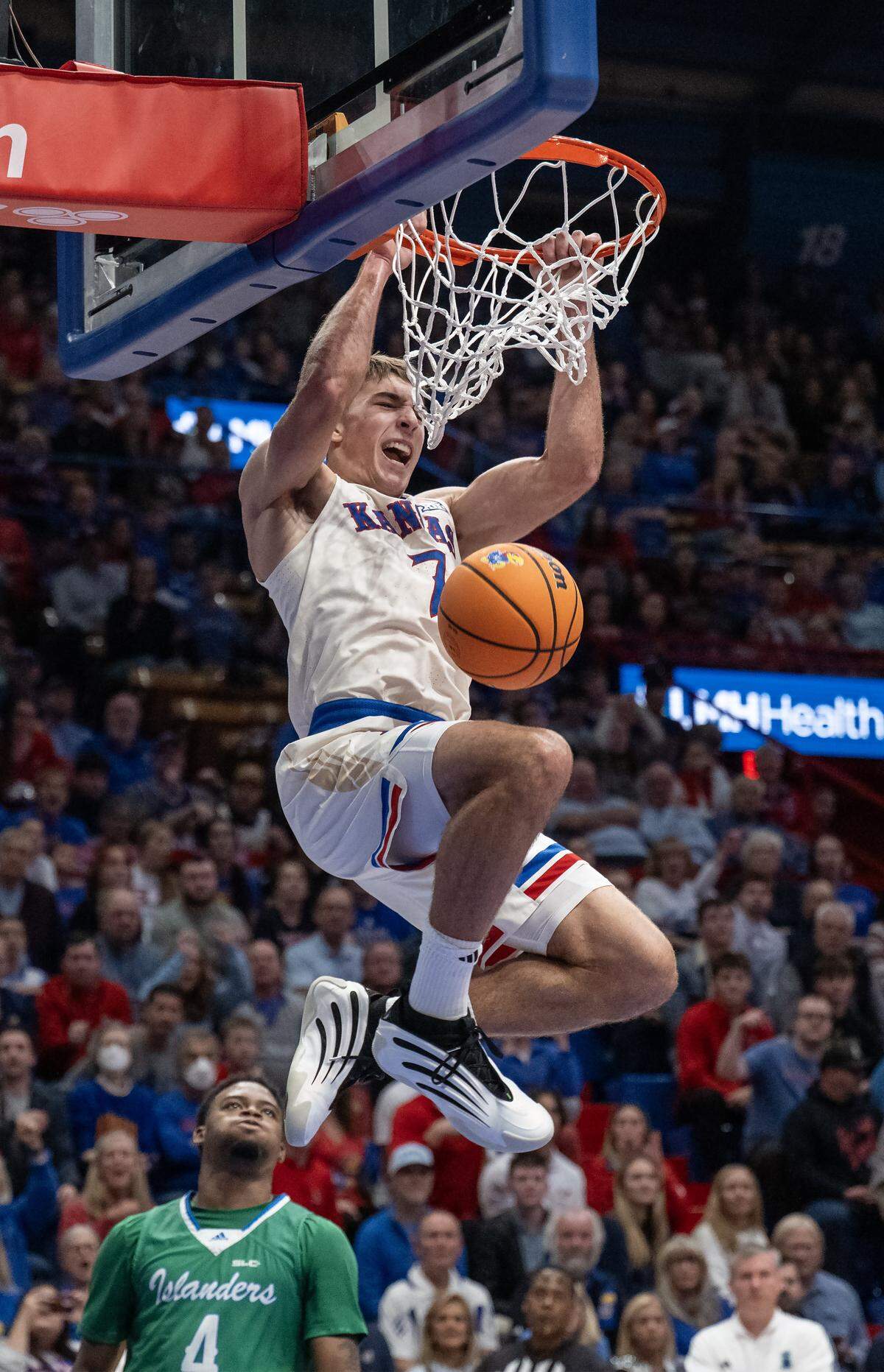 Kansas Jayhawks guard Kohl Rosario (7) slams a dunk against Texas A&M-CC Islanders in the first half at Allen Fieldhouse on Tuesday, November 11, 2025, in Lawrence.