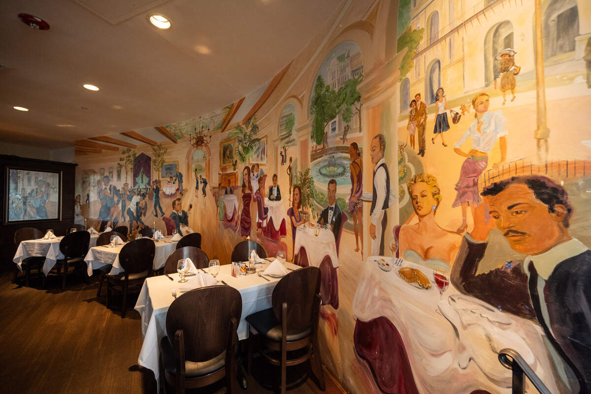 A mural on the wall greets diners at Piropos, on Tuesday, June 2, in Kansas City. The restaurant serves traditional Argentinian foods including empanadas and almendrado ice cream.