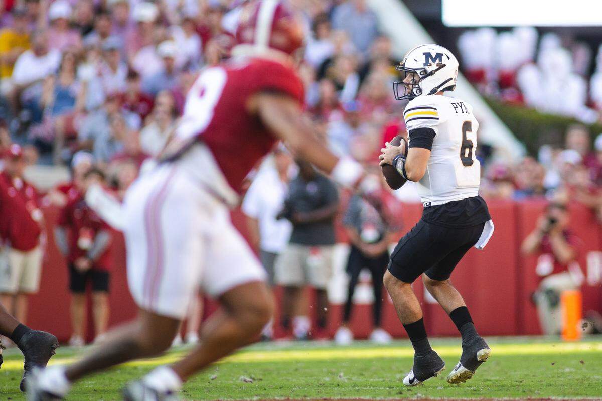 Missouri Tigers quarterback Drew Pyne drops back against the Alabama Crimson Tide during Saturday’s game at Bryant-Denny Stadium.