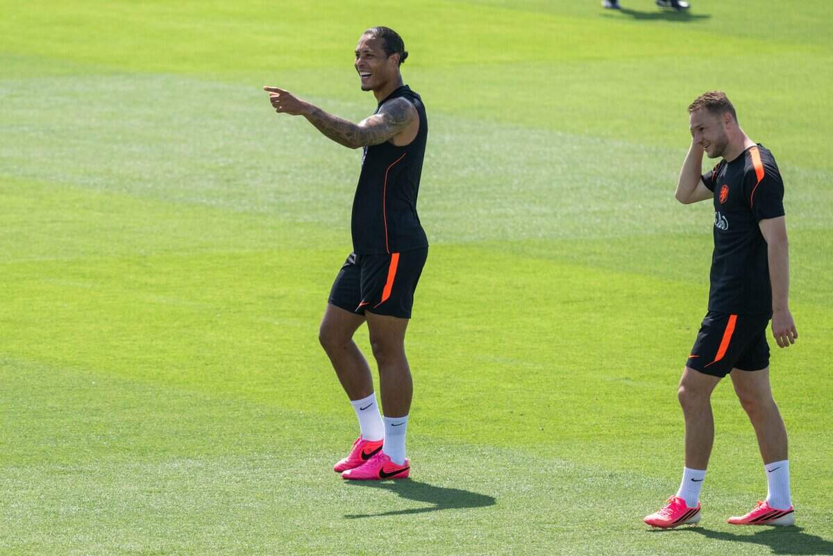 Team captain Virgil van Dijk of the Netherlands smiles and points to a teammate during open practice on Wednesday, June 10, 2026, in Riverside. The Dutch national team will train between matches at the Kansas City Current training facility.