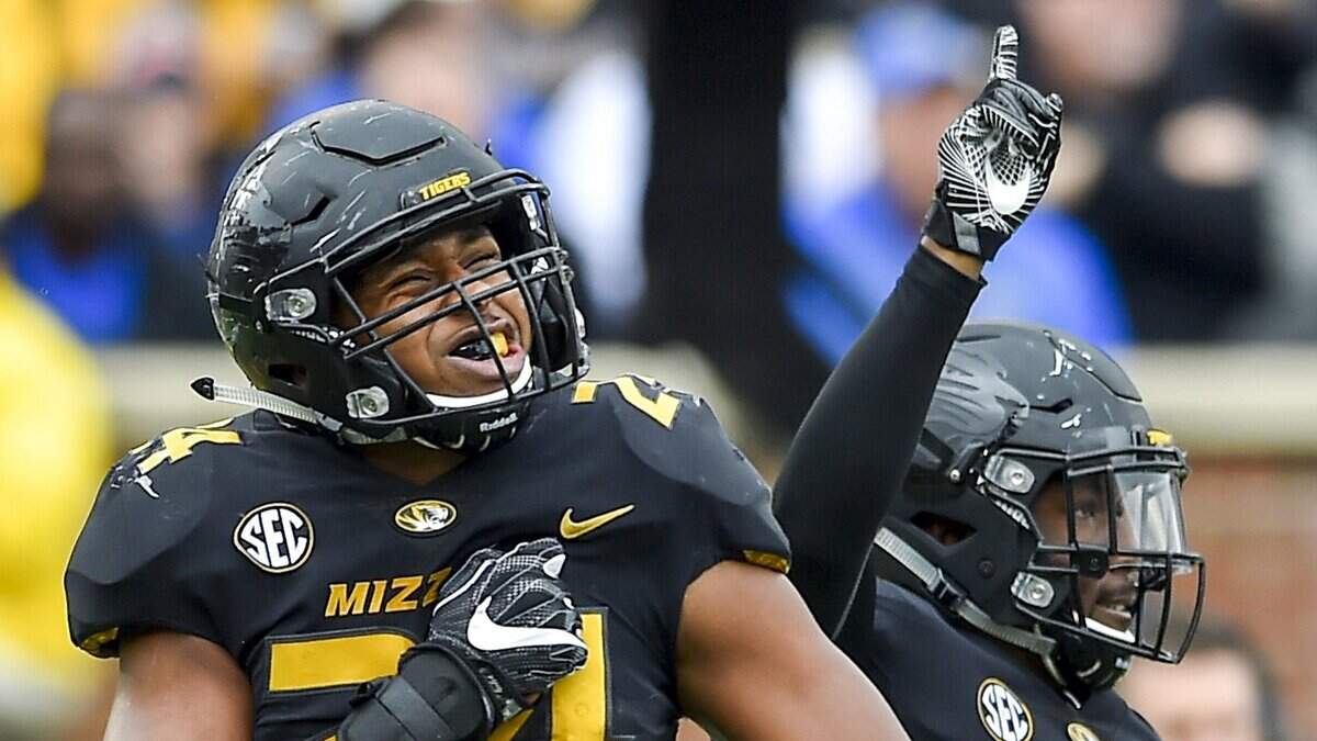 Senior linebacker Terez Hall (left) has long brought much heart and energy to the Missouri defense.