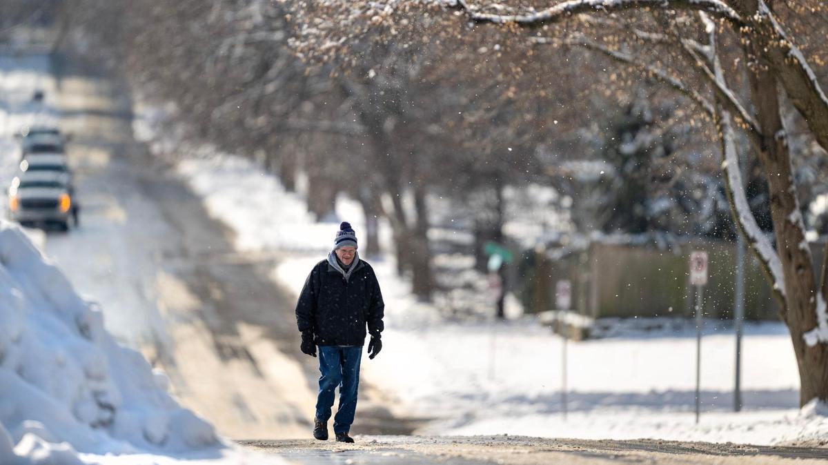 Jim LeBow of Kansas City ventured out for a walk on the wet, snowy, and slick streets near Loose Park on Friday, Jan. 10, 2025. “The City’s done a great job,” LeBow said, praising the City’s snow management efforts.