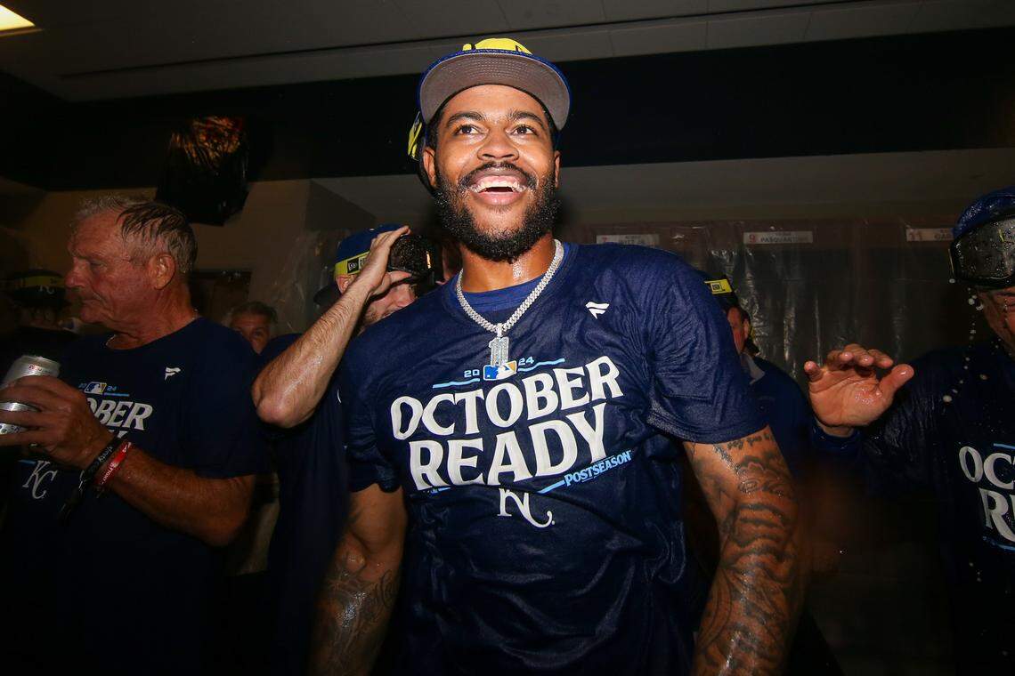 Sep 27, 2024; Atlanta, Georgia, USA; Kansas City Royals third baseman Maikel Garcia (11) celebrates after clinching a wild card playoff birth after a game against the Atlanta Braves at Truist Park.