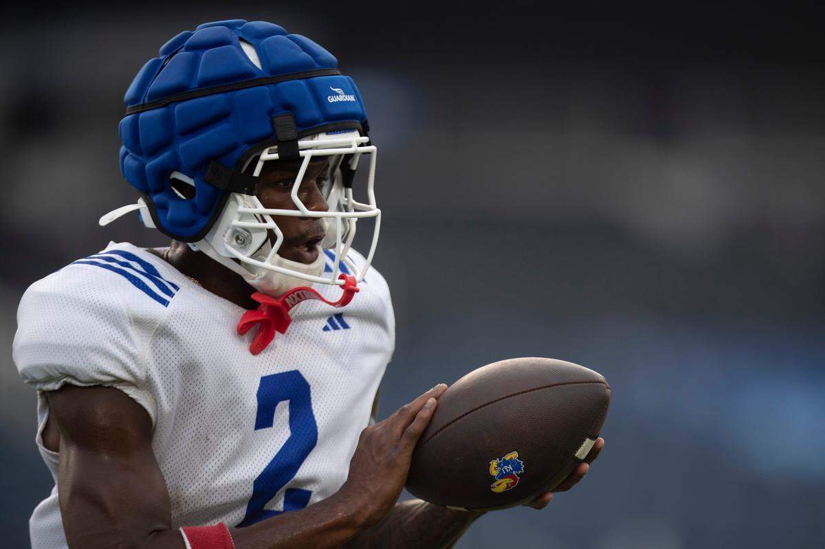 Kansas wide receiver Emmanuel Henderson Jr. (2) makes a catch during the Jayhawks’ first practice inside a renovated David Booth Kansas Memorial Stadium on Aug. 1, 2025.