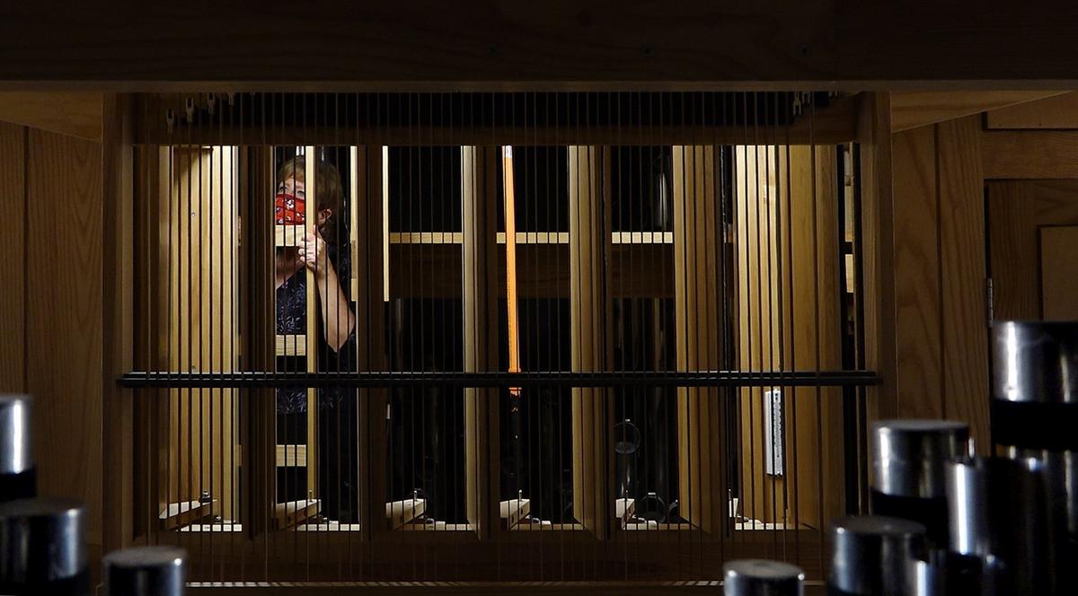 The Casavant Organ fills many “rooms” in Helzberg Hall at the Kauffman Center for the Performing Arts. Jan Kraybill inspects them all, and the organ’s 5,548 pipes.
