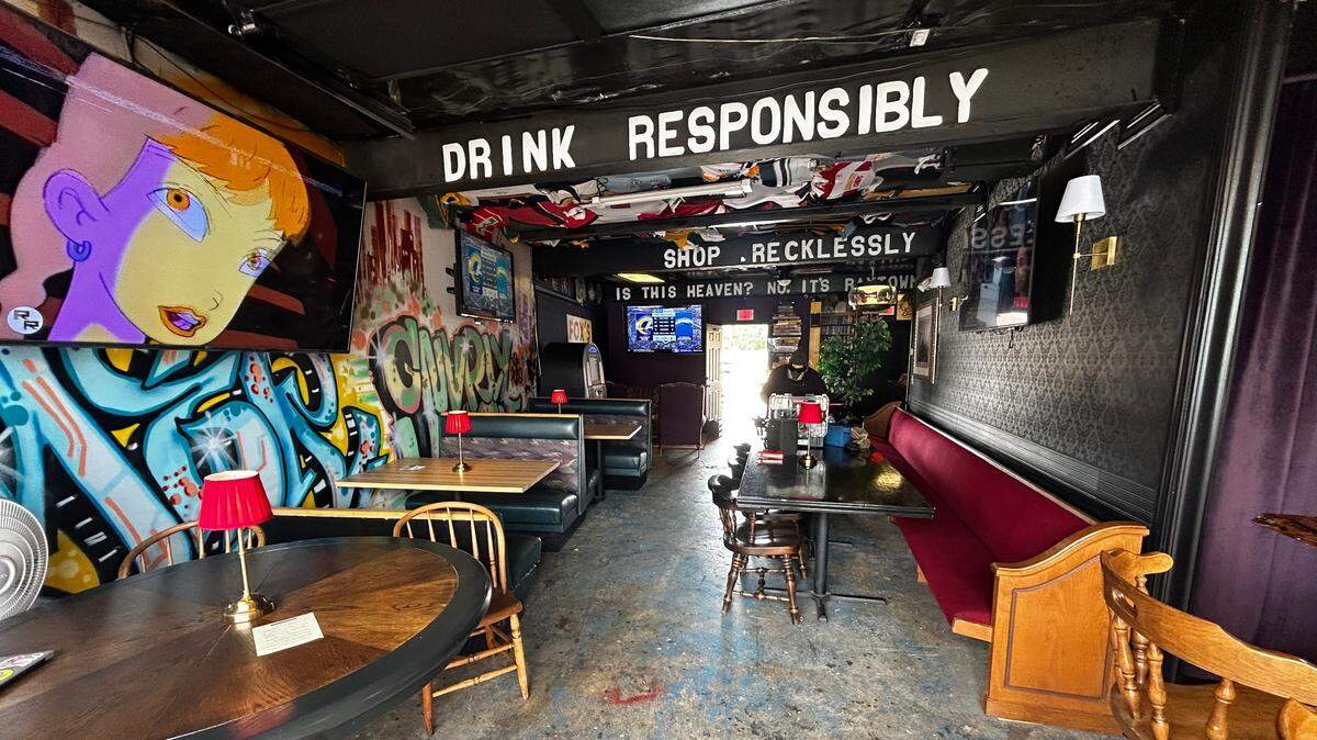 Gnarly Hussle’s bar sits in a former garage to the south of the vintage shop in Raytown.