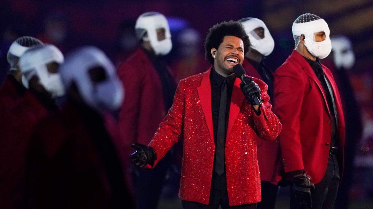 The Weeknd performs during the halftime show at Sunday night’s Super Bowl LV between the Kansas City Chiefs and Tampa Bay Buccaneers in Tampa, Fla.