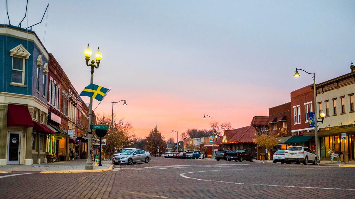 A Swedish flag hangs on a light pole on the corner of Main Street and Lincoln Street in downtown Lindsborg, Kansas.