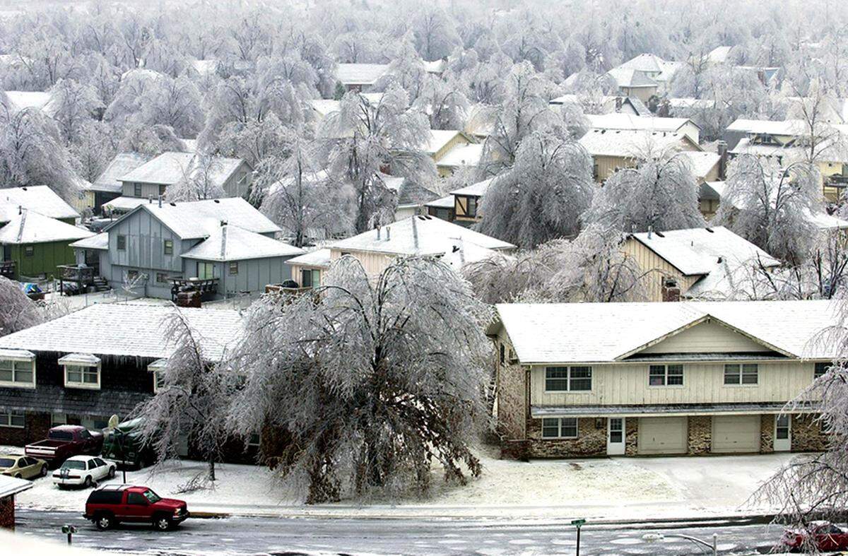 Area residents awoke to a vista of ice-heavy trees and glazed rooftops, like these seen form the Good Samaritan Towers in Olathe in 2002.