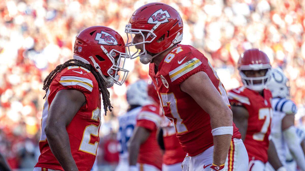 Chiefs running back Kareem Hunt, left, celebrates his touchdown with tight end Travis Kelce during an NFL Week 12 game against the Indianapolis Colts at GEHA Field at Arrowhead Stadium in Kansas City on Sunday, Nov. 23, 2025. The Chiefs defeated the Colts 23-20 in overtime.
