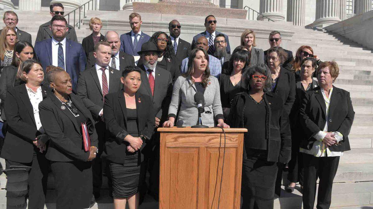 Missouri House Minority Leader Crystal Quade, a Springfield Democrat, center, and fellow House Democrats push for legislation that would allow local governments to enact stricter gun regulations following the mass shooting at the Kansas City Chiefs Super Bowl victory rally.