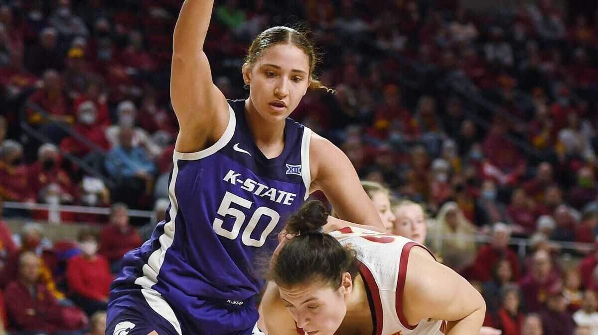 Kansas State Wildcats center Ayoka Lee defends Iowa State’s Beatriz Jordo at Hilton Coliseum in Ames, Iowa, on Wednesday, Feb. 2, 2022.