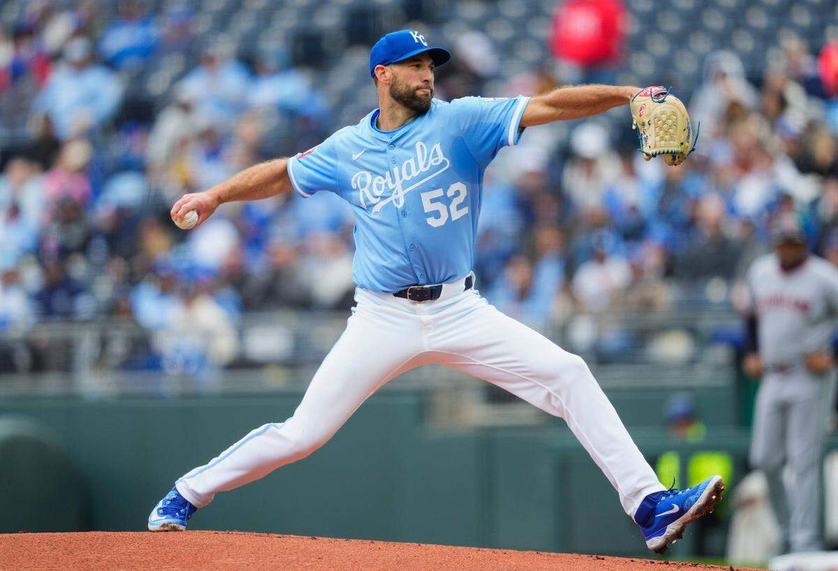 Kansas City Royals starting pitcher Michael Wacha throws during the first inning of a Major League Baseball game against the Cleveland Guardians at Kauffman Stadium on Sunday, March 30, 2025.