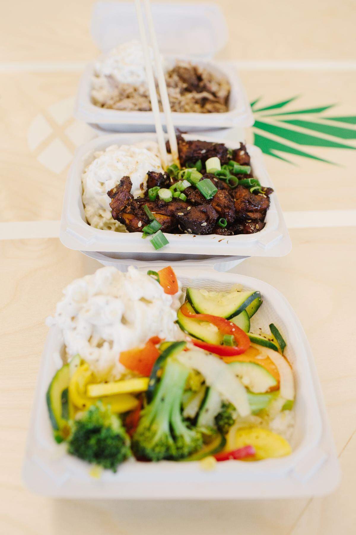 Hawaiian Bros Island Grill offers a traditional Hawaiian plate lunch with a scoop of white rice, a scoop of macaroni salad and a protein, along with other menu items.