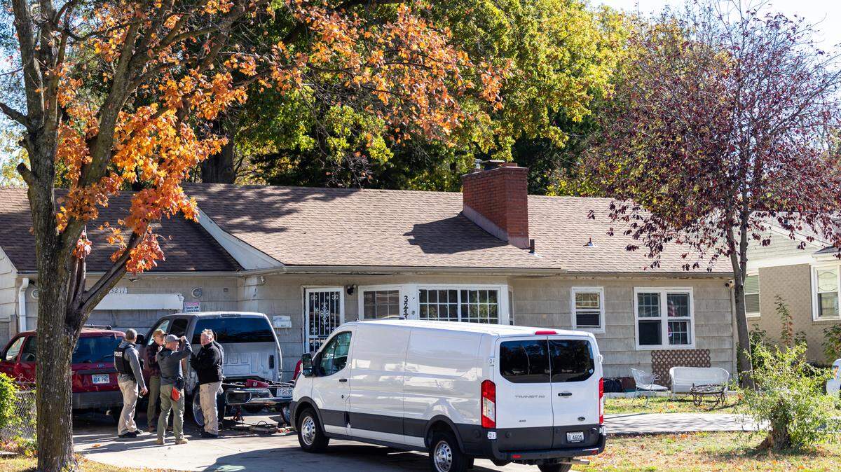 Police investigators could be seen working at a home along Crysler Avenue in Independence Thursday morning. Police have said they are investigating the death of a 7-year-old child.
