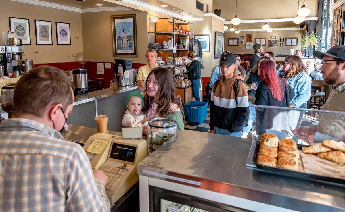 Customers queued up Wednesday at the Broadway Cafe in Westport.