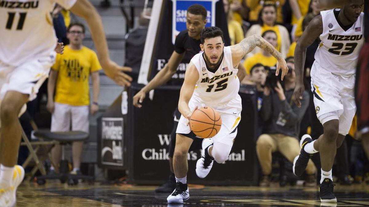 Missouri Tigers guard Jordan Geist (center) sprints upcourt in this file photo.