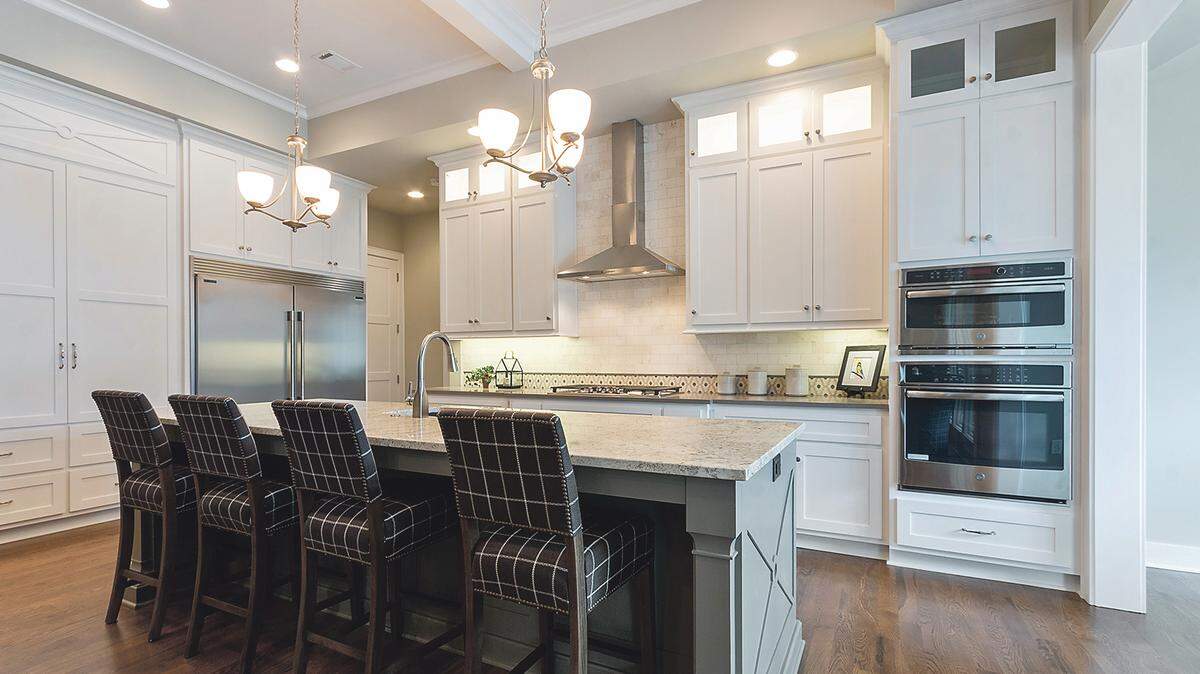 The well-appointed kitchens in Tuscany Piazza Townhomes offer abundant storage and working space.