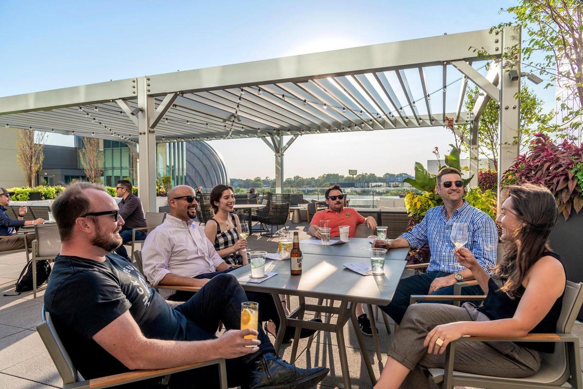 Friends, from left, R.L. Brooks, Alfredo Garcia, Alexandra Gouk, Adam Dolski, Steve Bastasctt and Colleen Monroe gathered in September for cocktails at Horsefeathers, the new outdoor dining area of the Loews Kansas City Hotel, 1515 Baltimore Avenue.