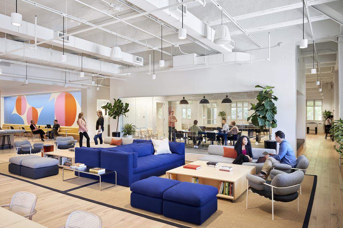 The commons area of Sprint’s headquarters building at 6200 Sprint Parkway is pictured here. The wireless carrier just completed an office rehab project with the help of WeWork, which is known for creating hip coworking spaces for entrepreneurs and freelancers.