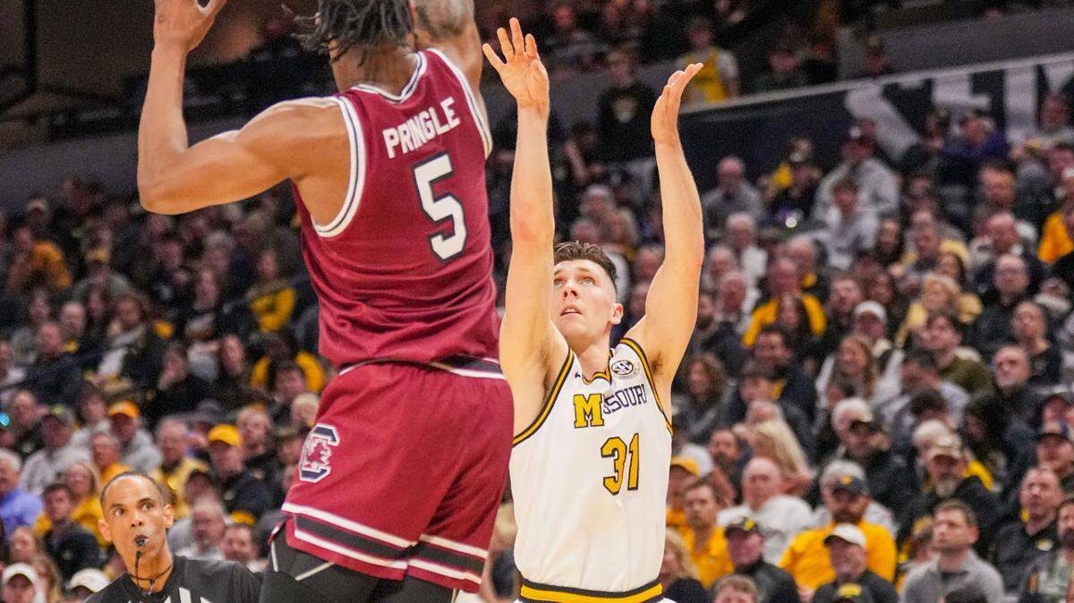 Missouri Tigers guard Caleb Grill (31) shoots over South Carolina Gamecocks forward Nick Pringle (5) during the first half at Mizzou Arena on Feb. 25, 2025.