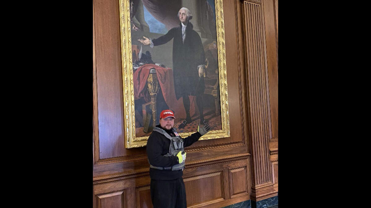 Michael Eckerman entered a sensitive area of the Capitol on Jan. 6, 2021, federal court documents said, where he took celebratory photos — including a selfie in front of a portrait of George Washington.