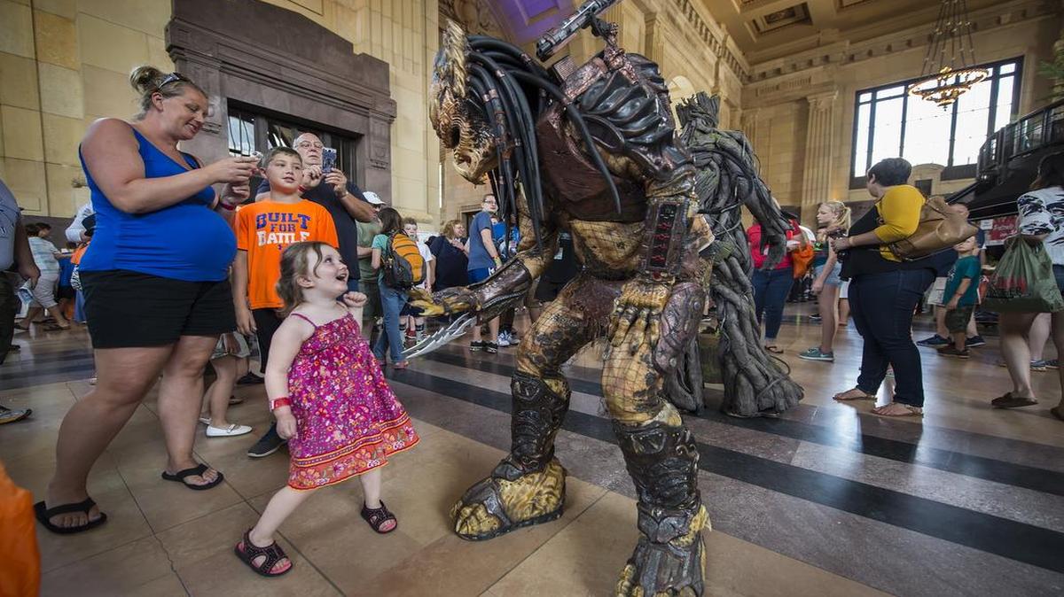 
Brigid Reilly, 3, of Belton, reacted to the costume worn by James Bink from the movie "Predator," at the fifth annual Maker Faire at Union Station on Saturday.

