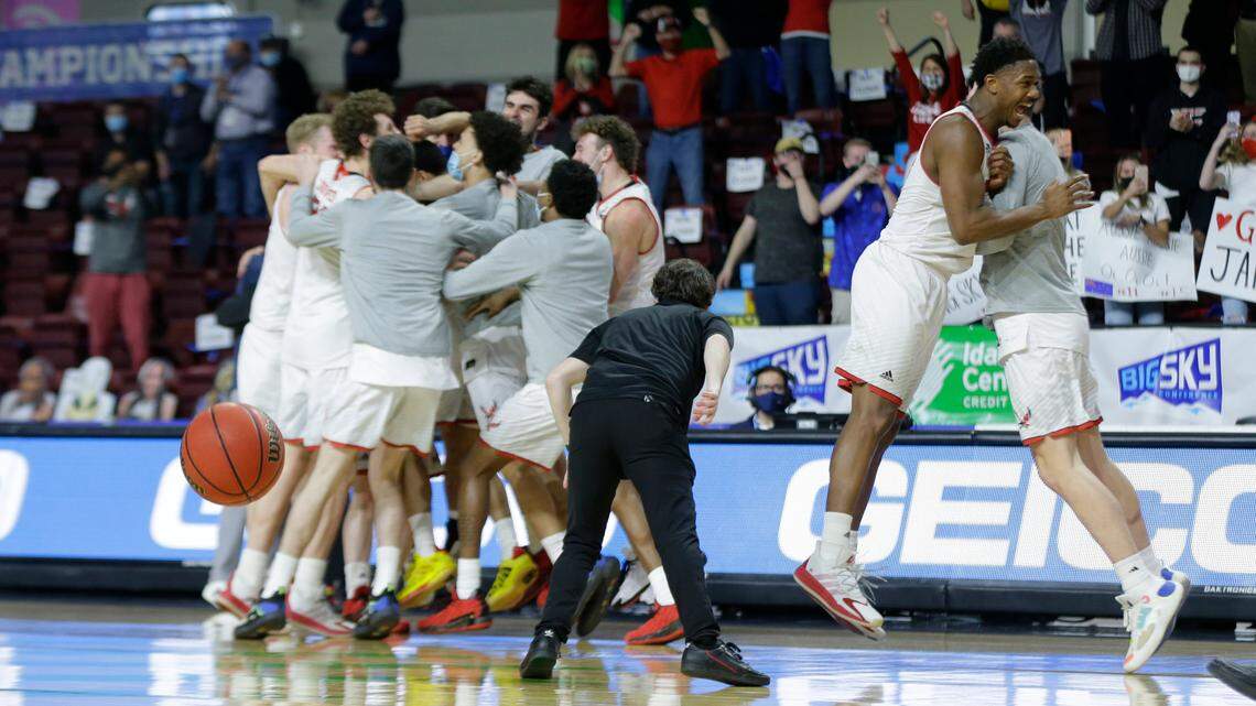 Eastern Washington players celebrate a 65-55 win over Montana State during an NCAA college basketball game for the championship of the Big Sky men’s tournament in Boise, Idaho, Saturday, March 13, 2021. (AP Photo/Otto Kitsinger)