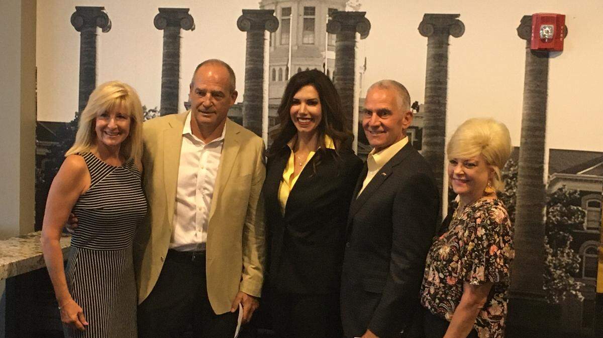 New University of Missouri athletic director Desiree Reed-Francois (center) posed with former Tigers football coach Gary Pinkel (second from left); his wife, Missy (far left); former MU athletic director Mike Alden (second from right) and his wife, Rockie (far right) after she was introduced on Wednesday, Aug 11, 2021 in Columbia.