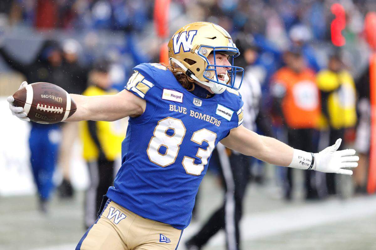 Winnipeg Blue Bombers wide receiver Dalton Schoen celebrates a touchdown reception against the BC Lions during a Canadian Football League game in 2022.