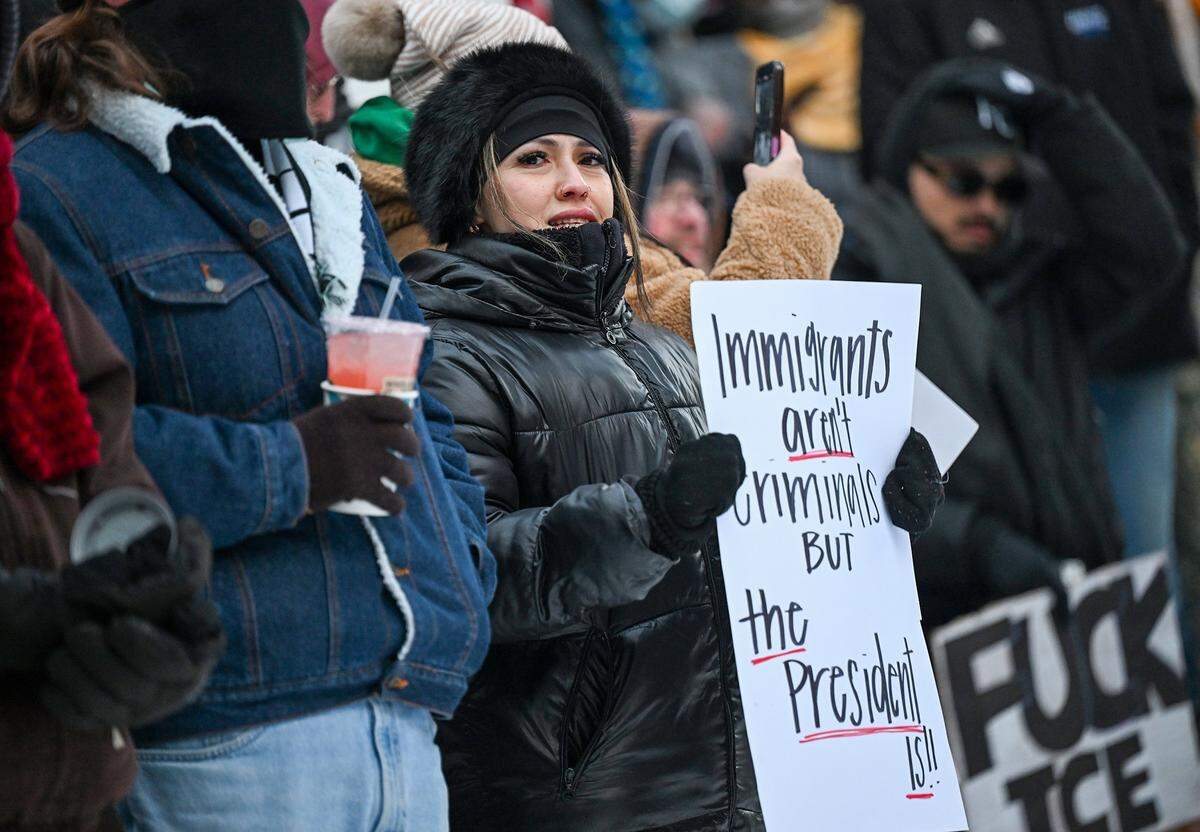 Protesters joined nationwide demonstrations against ICE in downtown Kansas City in freezing temperatures on Friday, Jan. 30, 2026.