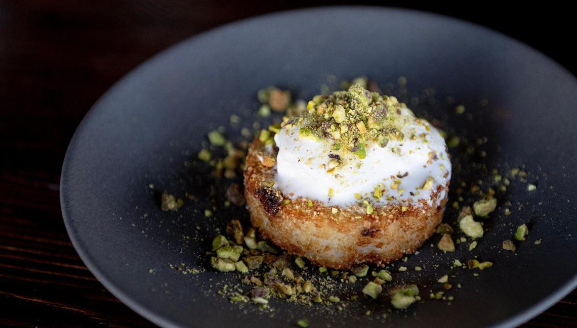 The arroz con leche made with sweet rice, cinnamon, raisins, roasted pistachios and ice cream is on the menu at Barbacoa.