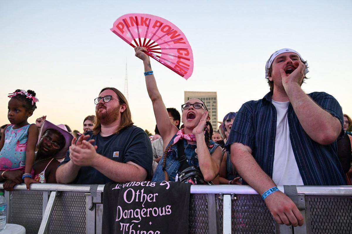 Fans cheer on the opening acts at the Chappell Roan concert on Saturday, Oct. 4, 2025, at the National WWI Museum and Memorial in Kansas City.