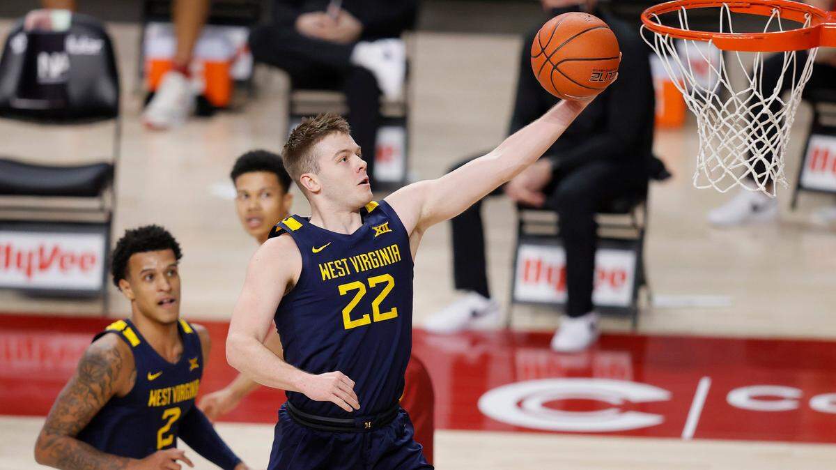 West Virginia guard Sean McNeil puts up a shot against Iowa State during the game on Tuesday, Feb. 2, 2021 in Ames, Iowa. West Virginia won 76-72.